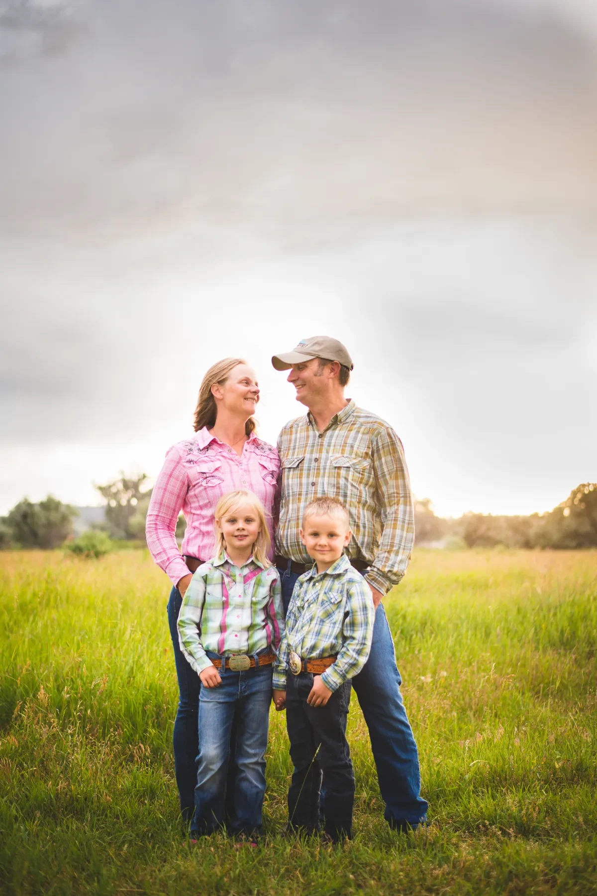 A family standing together in a Montana meadow