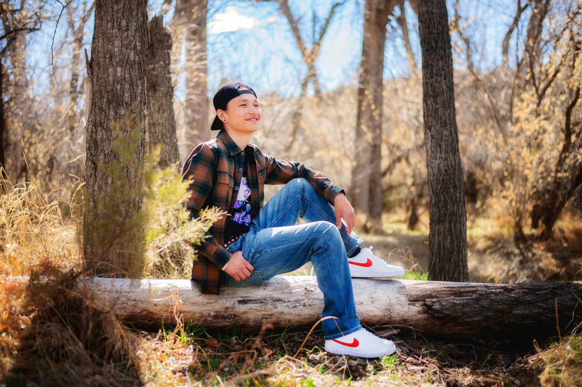 Senior portrait among trees