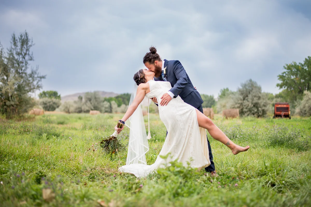 Engaged couple celebrating together outdoors
